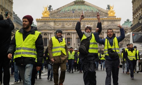 Gilets jaunes protest in front of the Paris Opera.
