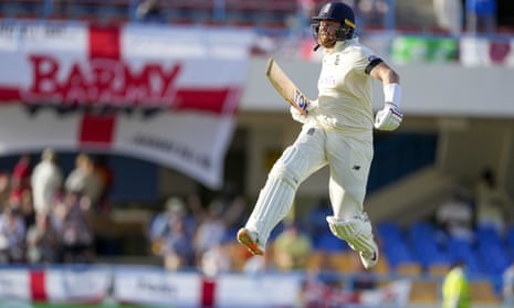 England's Jonny Bairstow leaps in celebration after reaching his hundred