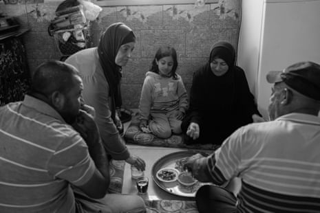 Halima and Ahmed share a breakfast with family members