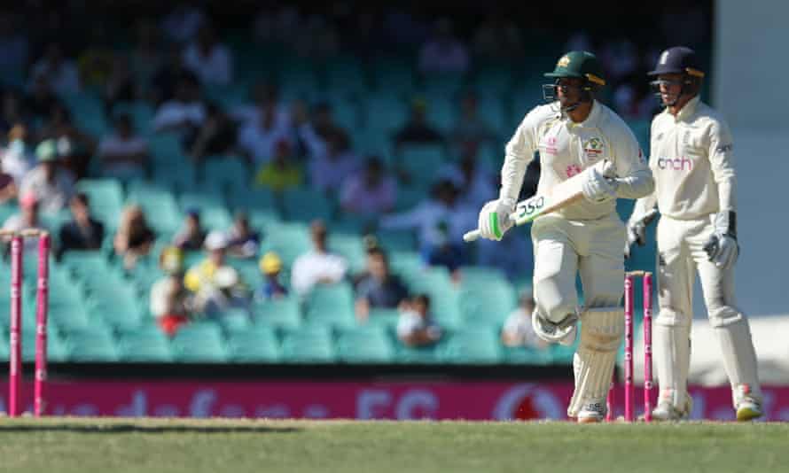 Usman Khawaja makes a run during the fourth Test
