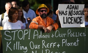 Environmental activists voice their opposition to Adani’s proposed Carmichael coalmine.