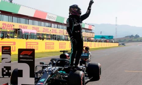 Lewis Hamilton celebrates after sealing pole position after the qualifying session at the Mugello circuit