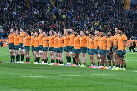 The Wallabies line up for the national anthem