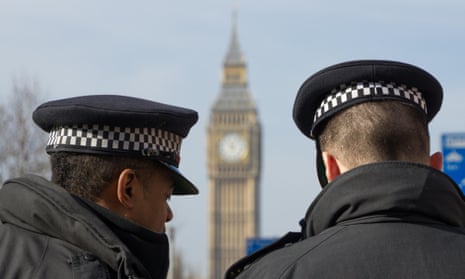 Two Metropolitan police Officers near Big Ben.