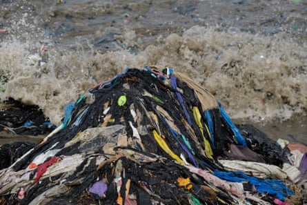 ‘The horrific pollution of waste colonialism’ … a heap of textile and plastic waste seen at the beach at Jamestown in Accra, Ghana