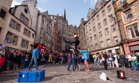 A street artist performs during a pre-pandemic Edinburgh fringe festival. The city is normally crowded throughout the summer.