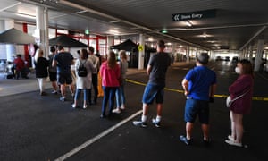 People queue to get a Covid vaccine at a Bunnings store in Brisbane on Saturday