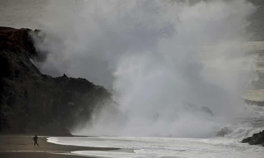 Tonga volcano eruption: Pacific tsunami damage unclear as ash blankets island nation | Tonga 2 Large waves crash ashore at Wrights Beach, California, following an undersea eruption of the Hunga Tonga Hunga Ha’apai volcano in Tonga.