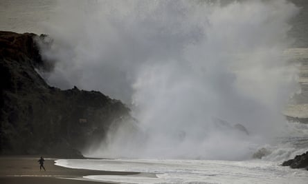 Large waves crash ashore at Wrights Beach, California, following an undersea eruption of the Hunga Tonga Hunga Ha’apai volcano in Tonga.