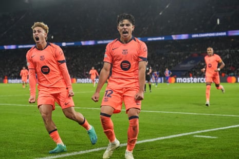 Barcelona players, including Xavi Espart, celebrate a goal by shouting and clenching their fists