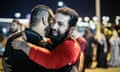 two Arab men embracing joyfully