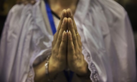 Chinese Christian prays