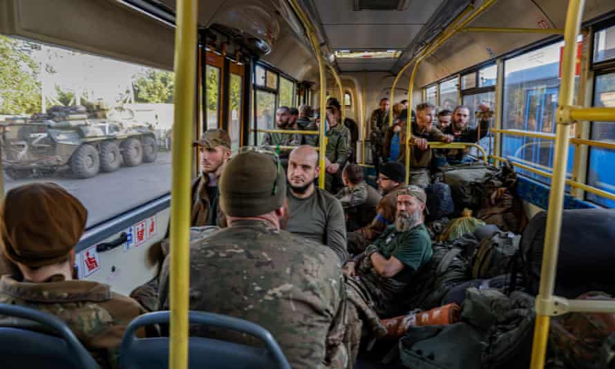 Ukrainian troops being evacuated by bus from the Azovstal plant.