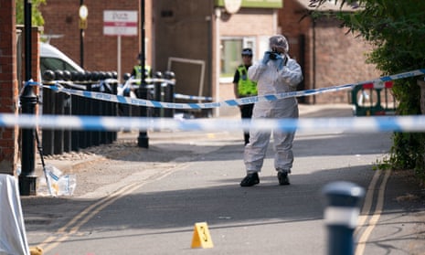 A forensic officer near the scene in Boston where Valutyte died.