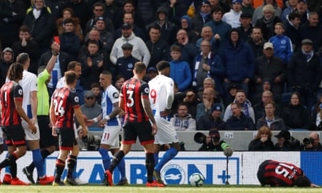 An early bath for Brighton’s Anthony Knockaert (fourth right) as referee Kevin Friend waves a red card in his direction.