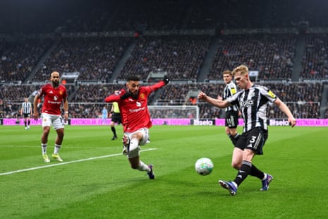 Lewis Hall crosses the ball under pressure from Casemiro.