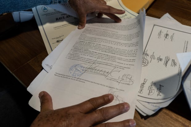 San Jose, Costa Rica. January 22, 2019 Raul Oporta showing the original court documents that sentenced him to two years in prison.