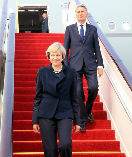 British prime minister Theresa May and chancellor Philip Hammond are given the full red carpet treatment on arrival in Hangzhou on Sunday.