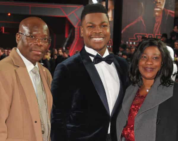Actor John Boyega with his parents at the London premiere of Star Wars: The Last Jedi in December 2017
