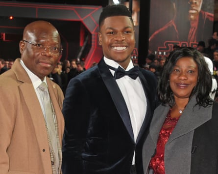 Actor John Boyega with his parents at the London premiere of Star Wars: The Last Jedi in December 2017
