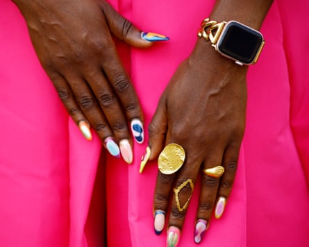 Hands of black person with bold nailss