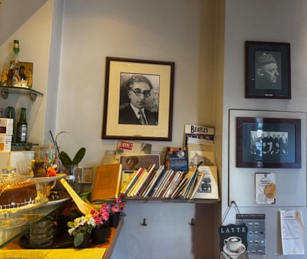 Photographs of Greek poets line the walls of Cafe des Poètes.