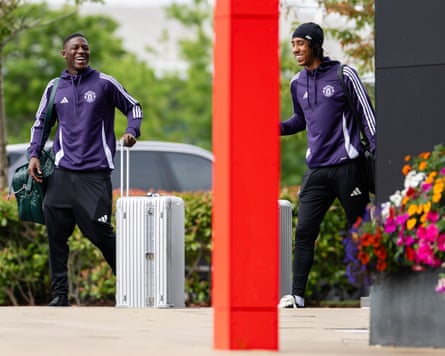 Manchester United’s Leny Yoro (right) and Kobbie Mainoo are in good spirits as they arrive at Carrington for pre-season training in July.