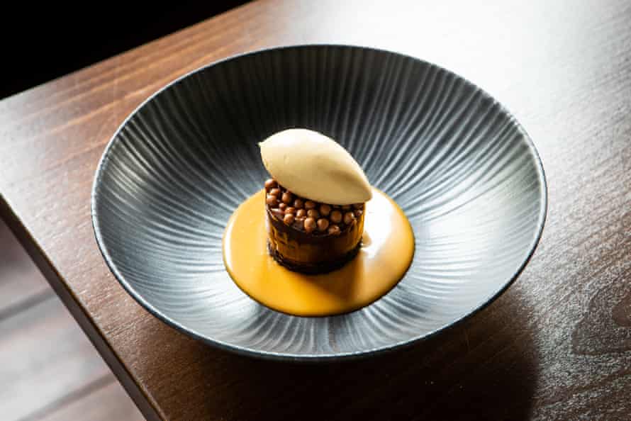 Tallow’s chocolate brownie: ‘a plinth of rich chocolate-and-hazlenut mousse in a glistening pool of salted caramel and miso sauce.’