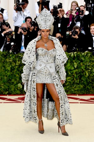All hail the pope. After arriving in her own pope-mobile, Rihanna had her own take on papal style with her custom designed Maison Margiela gown.