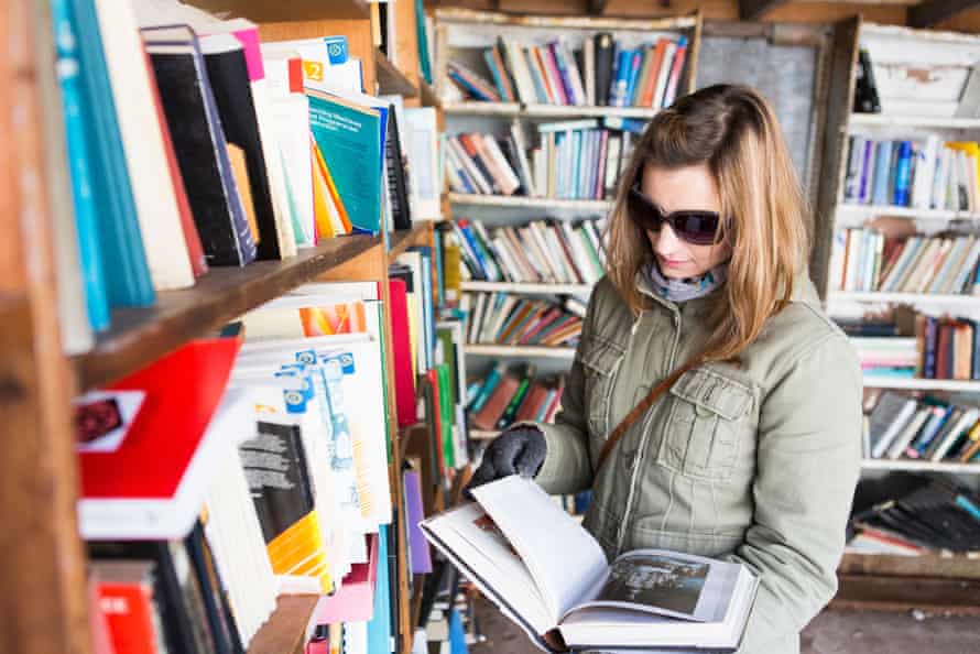 A woman in a book shop at Hay