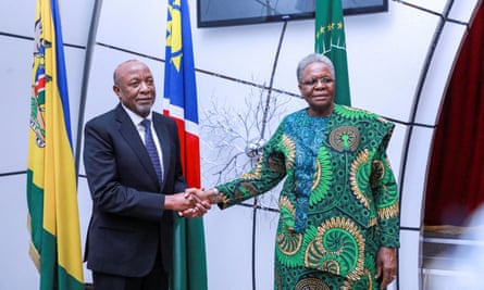 Namibian president Nangolo Mbumba shakes hands with his vice-president Netumbo Nandi-Ndaitwah in February.