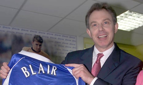 Tony Blair with an Everton shirt presented to him in 2001.