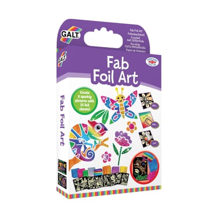 A purple craft kit box shows a glittery butterfly, chameleon, and flower foil artwork samples