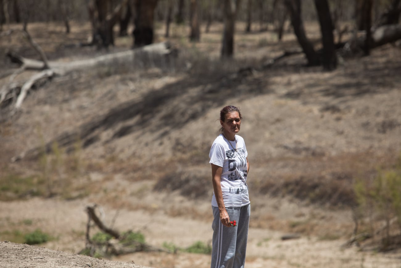 Vanessa Hickey standing next to the empty Barwon. She remembers jumping into the river as a child