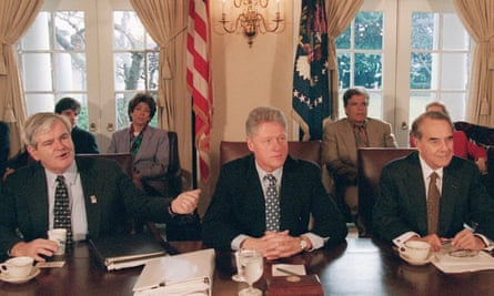 President Bill Clinton at a budget meeting with the House speaker Newt Gingrich, left, and Senate majority leader Bob Dole, right, in December 1995.