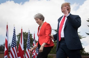 Donald Trump walks with Theresa May before a joint press conference at Chequers.