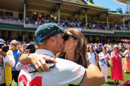 David Warner embraces his wife Candice after Australia’s series victory over Pakistan.