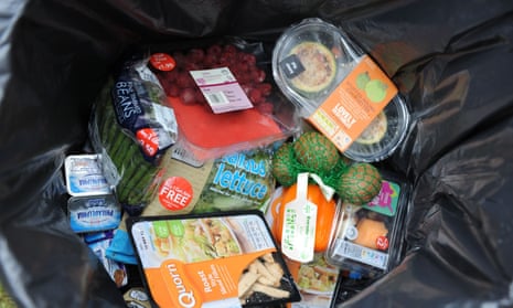 a load of unopened food products chucked in a bin