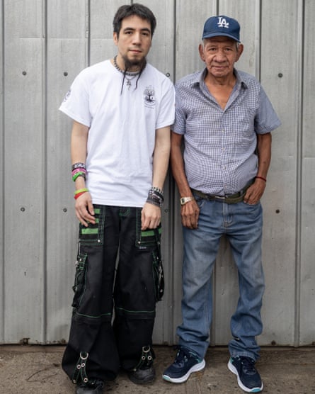 Ben with Luis, his biological father, outside the family’s house in Chillán, Chile