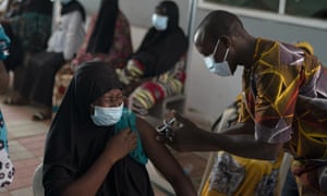 A health worker administers a dose of the Johnson &amp; Johnson Covid-19 vaccine at a hospital in the outskirts of Banjul, Gambia, on 23 September, 2021.