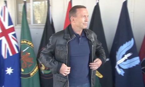 Tony Abbott wearing a bomber jacket at press conference in Iraq