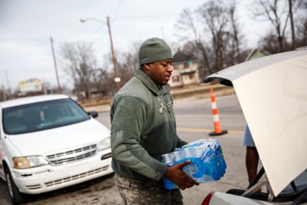 The national guard supplied bottled water to residents on 7 February 2016 in Flint, Michigan.