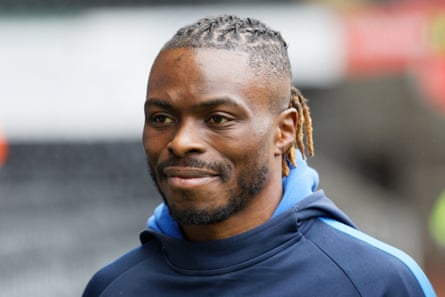 The former Democratic Republic of the Congo defender Gabriel Zakuani arrives for a game while playing for Gillingham