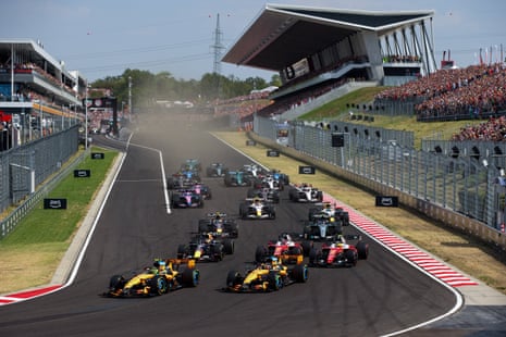 Cars enter the first corner.
