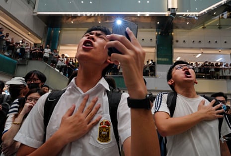Local residents sing Glory to Hong Kong at a shopping mall in Hong Kong in 2019. An appeals court granted the Hong Kong government's request to ban the song.