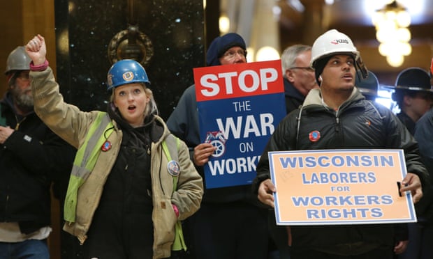 Workers protest in March 2015 inside the state capitol in Madison, Wisconsin, a state which has pioneered so-called ‘right-to-work’ legislation widely seen as an attack on unions.