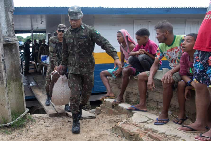 A Pirarucu fish is seized by the army after a Federal Police investigation examined a vessel seized by the Task Force for the rescue of Indigebista Bruno Pereira and journalist Dom Phillips, at the port of the city of Atalaia do Norte, Amazonas, Brazil, on June 11.