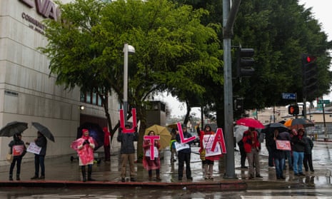 Teachers join the Los Angeles unified school district, (LAUSD) members as they strike in Los Angeles, on  Tuesday.