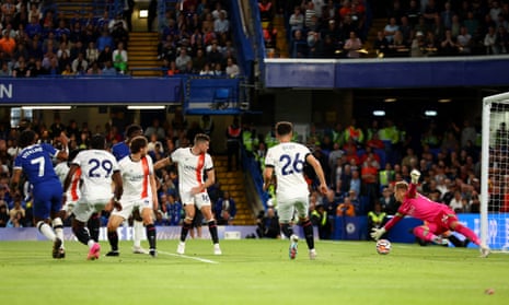 Chelsea's Raheem Sterling scores their first goal against Luton Town.