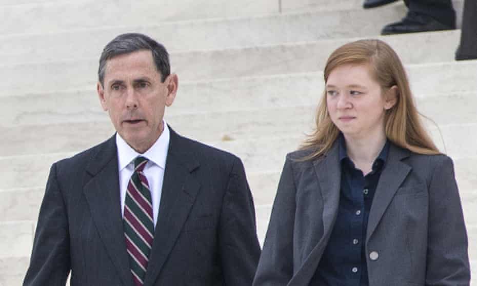 Abigail Fisher, who challenged the use of race in college admissions, right, walks with lawyer Edward Blum following oral arguments in the supreme court on 9 December.